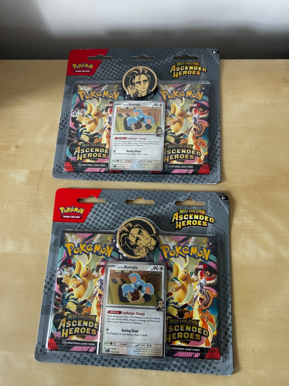 2 Pokémon Ascended Heroes Blister Pack with Komala Promo Card - Gray/Red/Yellow